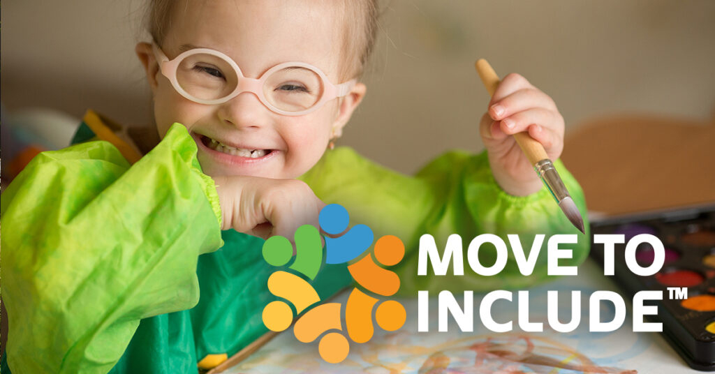 Child with glasses smiles while painting. Move to Include