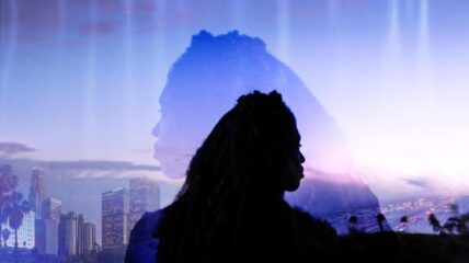 Two silhouettes superimposed in a photo with a cityscape in the background