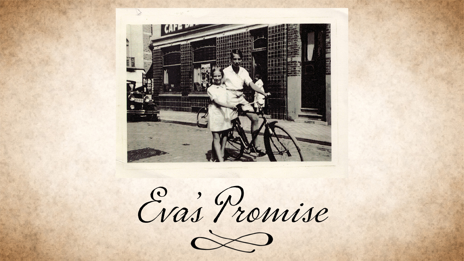 Title card for the film. A Black and white photo of a brother and sister on bikes. underneath the picture text reads: Eva's Promise