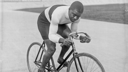 Major Taylor riding a bike